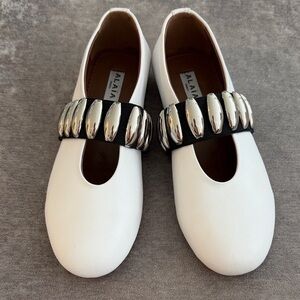 Alaia White Flats with Metallic Accents